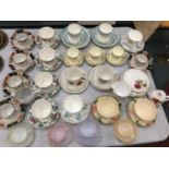 A QUANTITY OF CHINA AND CERAMIC CUPS AND SAUCERS TO INCLUDE ROYAL DOULTON 'FLORADORA GREEN',