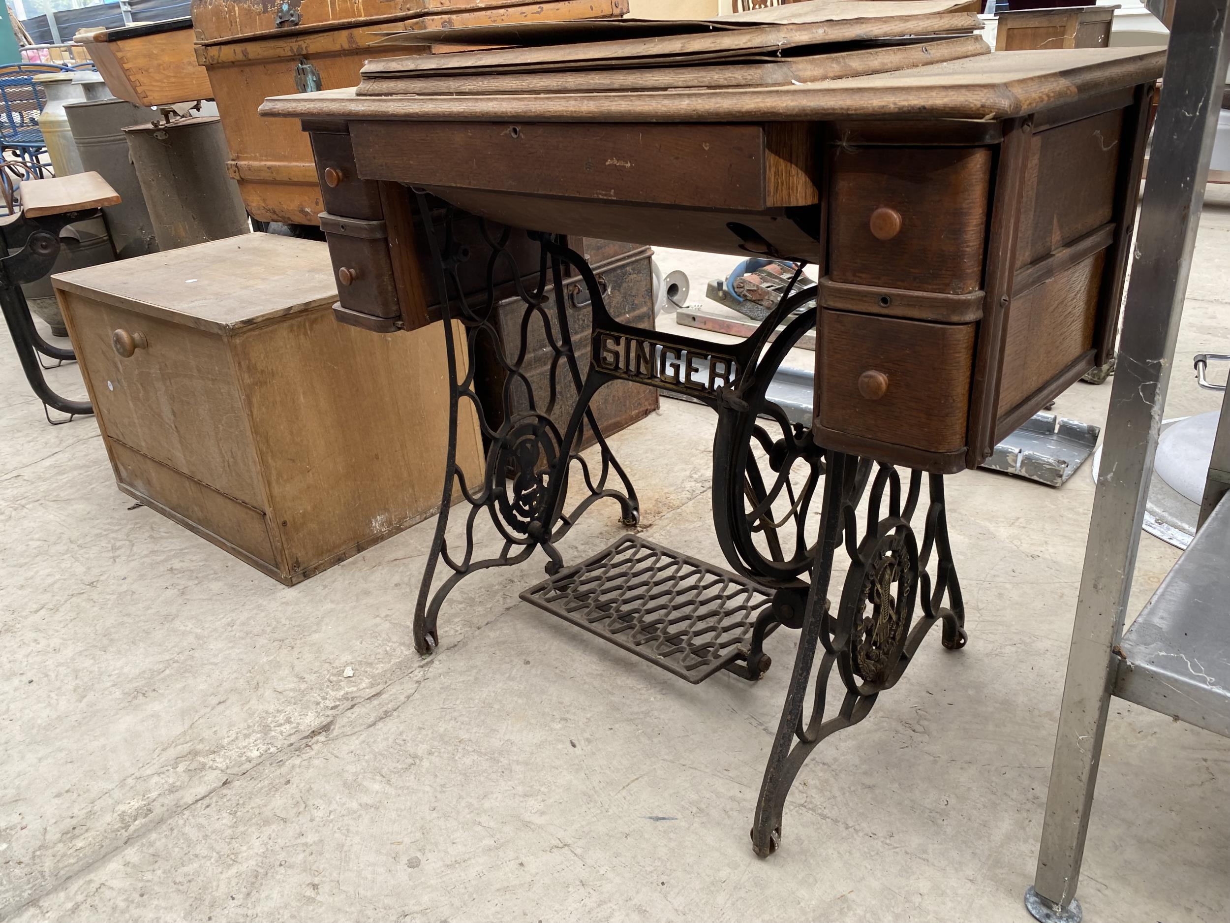A VINTAGE SINGER SEWING MACHINE WITH CAST TREDDLE BASE - Image 3 of 5