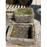 A PAIR OF RECONSTITUTED STONE TROUGH PLANTERS (ONE A/F)