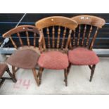 A PAIR OF VICTORIAN STYLE KITCHEN CHAIRS AND CAPTAINS STYLE CHAIR