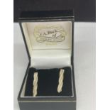 A PAIR OF 9 CARAT GOLD EARRINGS IN A PRESENTATION BOX