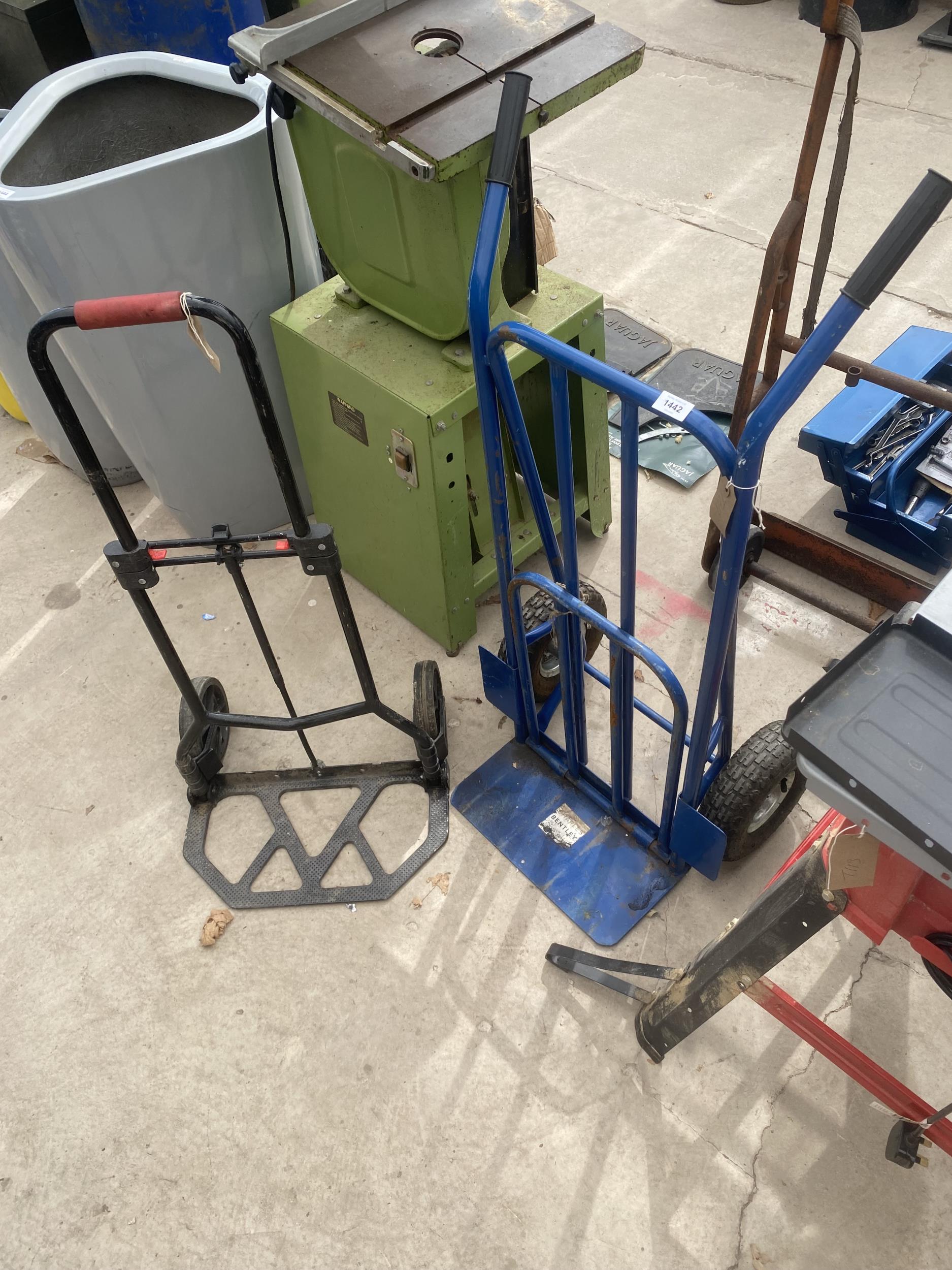 A FOLDING SACK TRUCK AND A FURTHER METAL SACK TRUCK