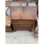 A 19TH CENTURY MAHOGANY FALL FRONT BUREAU, 28" WIDE WITH THREE DRAWERS TO THE BASE