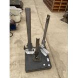 A MARBLE BASE STAND AND THREE ENGINEERS CLAMP STANDS