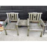 A WOODEN GARDEN LOVE SEAT WITH CENTRAL TABLE