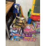 A LARGE ASSORTMENT OF CHILDRENS TOYS TO INCLUDE BOARD GAMES AND SPORTS EQUIPMENT ETC