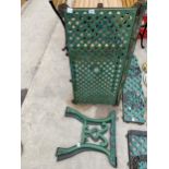 A DECORATIVE RECTANGULAR CAST IRON PATIO TABLE