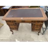 A CONTINENTAL TWIN PEDESTAL MAHOGANY DESK OF SEVEN DRAWERS, 43X24"