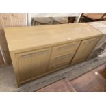 A MODERN OAK EFFECT SIDEBOARD, 55" WIDE