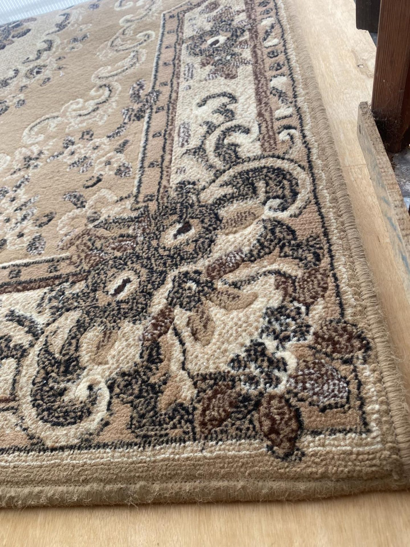 A CREAM PATTERNED RUG - Image 2 of 3