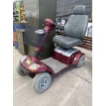 A STRIDER MOBILITY SCOOTER WITH FULL SUSPENSION BELIEVED IN WORKING ORDER BUT NO WARRANTY (KEY IN