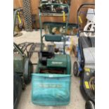 A QUALCAST CLASSIC PETROL 35S LAWN MOWER COMPLETE WITH GRASS BOX