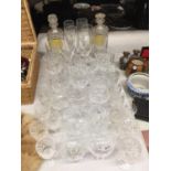 A QUANTITY OF GLASSES TO INCLUDE A GIN AND RUM DECANTER, WINE, SHERRY, PORT, BRANDY, ETC