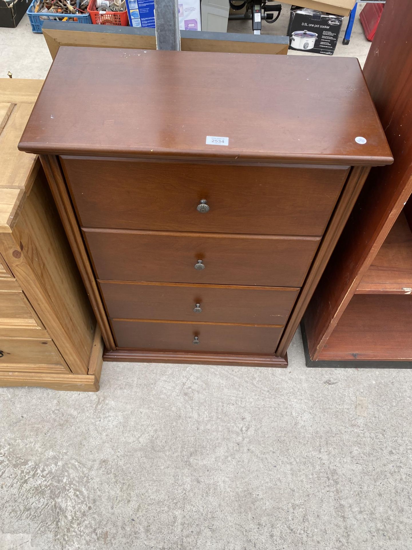 A MODERN TWO DRAWER SHOE CABINET