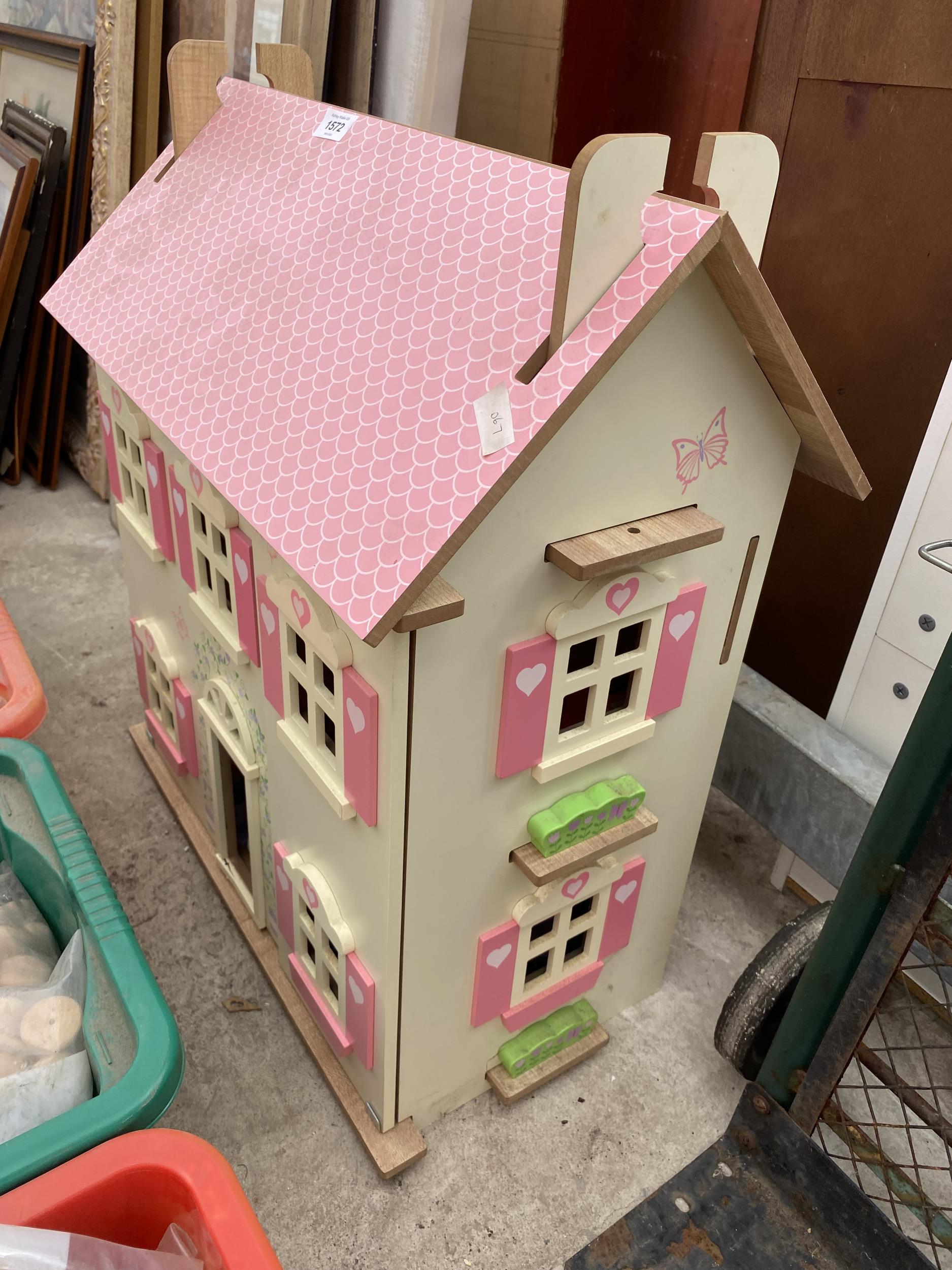 A PAINTED WOODEN DOLLS HOUSE - Image 2 of 3