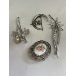 FOUR SILVER BROOCHES