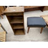 AN OPEN BOOKCASE AND STOOL