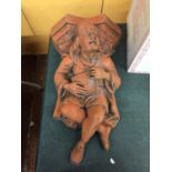 A TERRACOTTA WALL HANGING MINSTREL HEIGHT 56CM