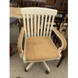 A MODERN CREAM PAINTED SWIVEL OFFICE CHAIR WITH LATH BACK