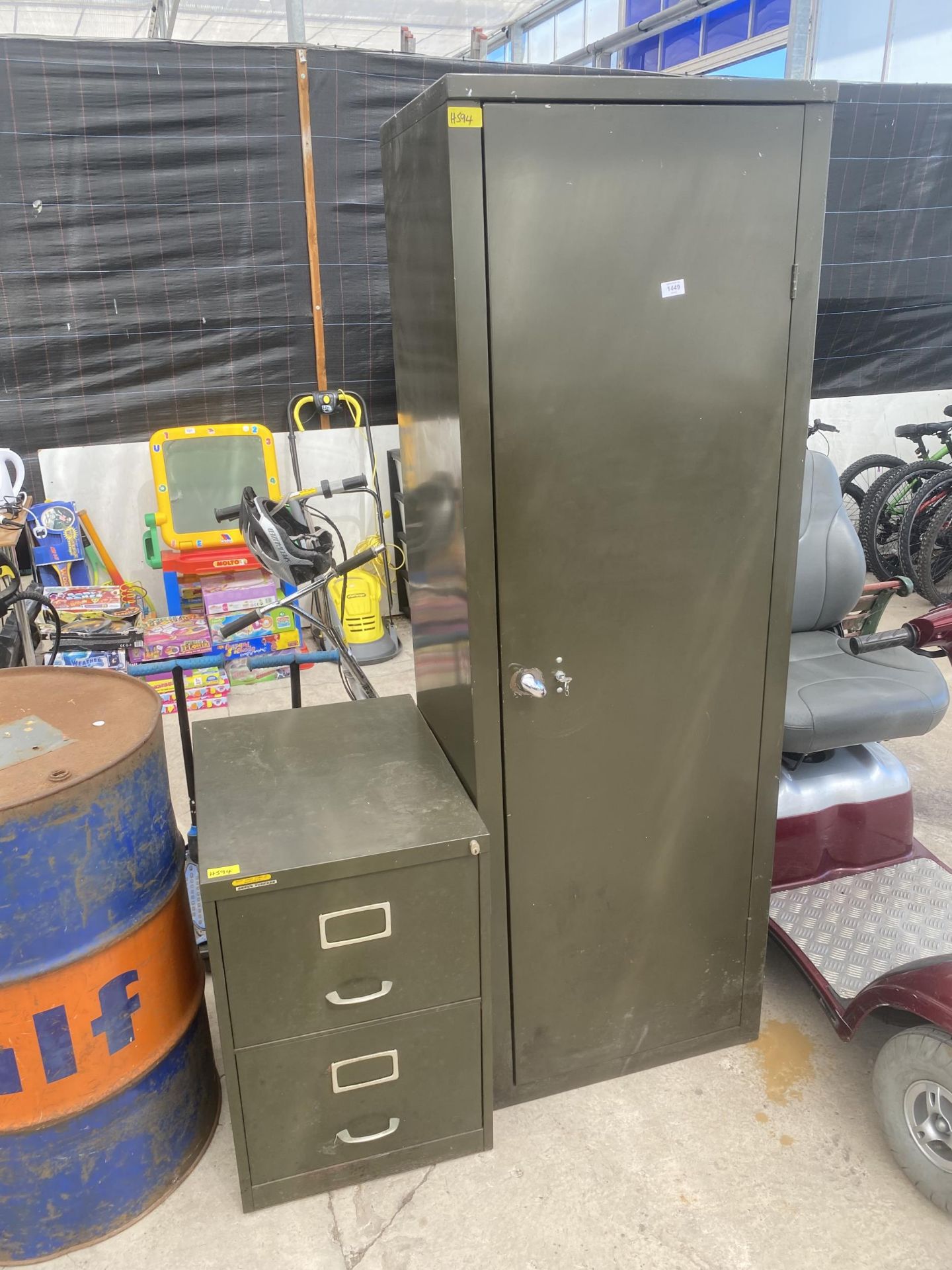 A VINTAGE METAL CUPBOARD AND A METAL TWO DRAWER FILING CABINET