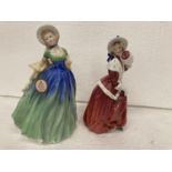 A ROYAL DOULTON FIGURINE HN 1992 "CHRISTMAS MORN" 18 CM TOGETHER WITH A FURTHER ROYAL DOULTON