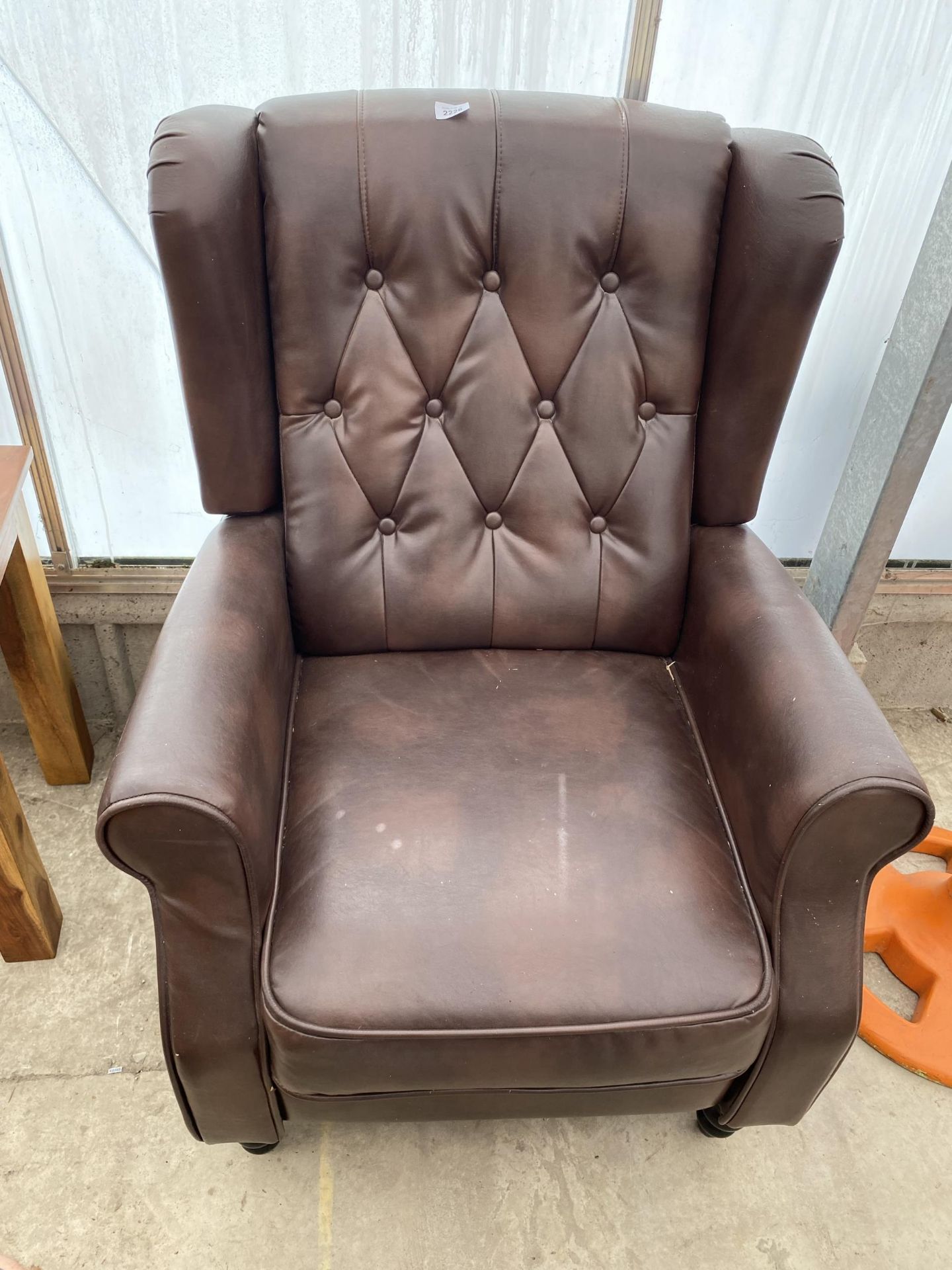 A MODERN 'MORE4HOMES' FAUX LEATHER RECLINING CHAIR