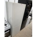 A WHITE BOSCH UPRIGHT FRIDGE FREEZER