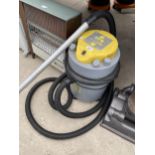 AN EARLEX COMBIVAC VACUUM CLEANER