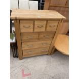 A MODERN OAK CHEST OF THREE SHORT AND THREE LONG DRAWERS, 36" WIDE