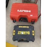 AN EMPTY HILTI CASE AND AN EMPTY DEWALT DRILL CASE