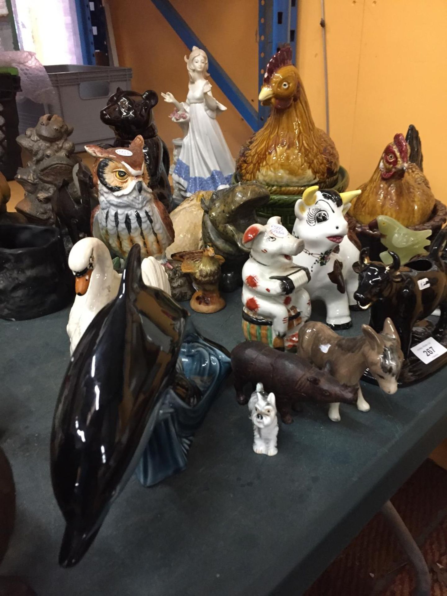 A QUANTITY OF CERAMIC ANIMALS TO INCLUDE HEN CROCKS, OWLS, COWS, PIGS, A POOLE DOLPHIN, ETC - Image 2 of 6