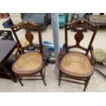 A PAIR OF EDWARDIAN BEDROOM CHAIRS AND LAMP TABLE