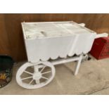 A WOODEN PAINTED SWEET CART