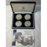 A UNITED KINGDOM ROYAL MINT 2003 “BRITTAIN’S DESIGN” ONE OUNCE SILVER BULLION FOUR COIN SET, WITH