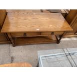 AN OAK ANDRENA COFFEE TABLE WITH TWO DRAWERS, 42X21" COMPLETE WITH ORIGINAL RECEIPT IN 2004, £360