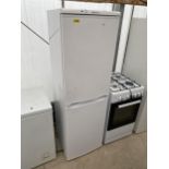 A WHITE HOTPOINT UPRIGHT FRIDGE FREEZER