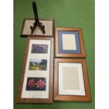 THREE WOODEN PICTURE FRAMES 2 AT 27CM X 32CM AND ONE 56CM X 26CM PLUS A PHOTO FRAME AND A PLATE