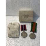 TWO WORLD WAR II MEDALS WITH RIBBONS