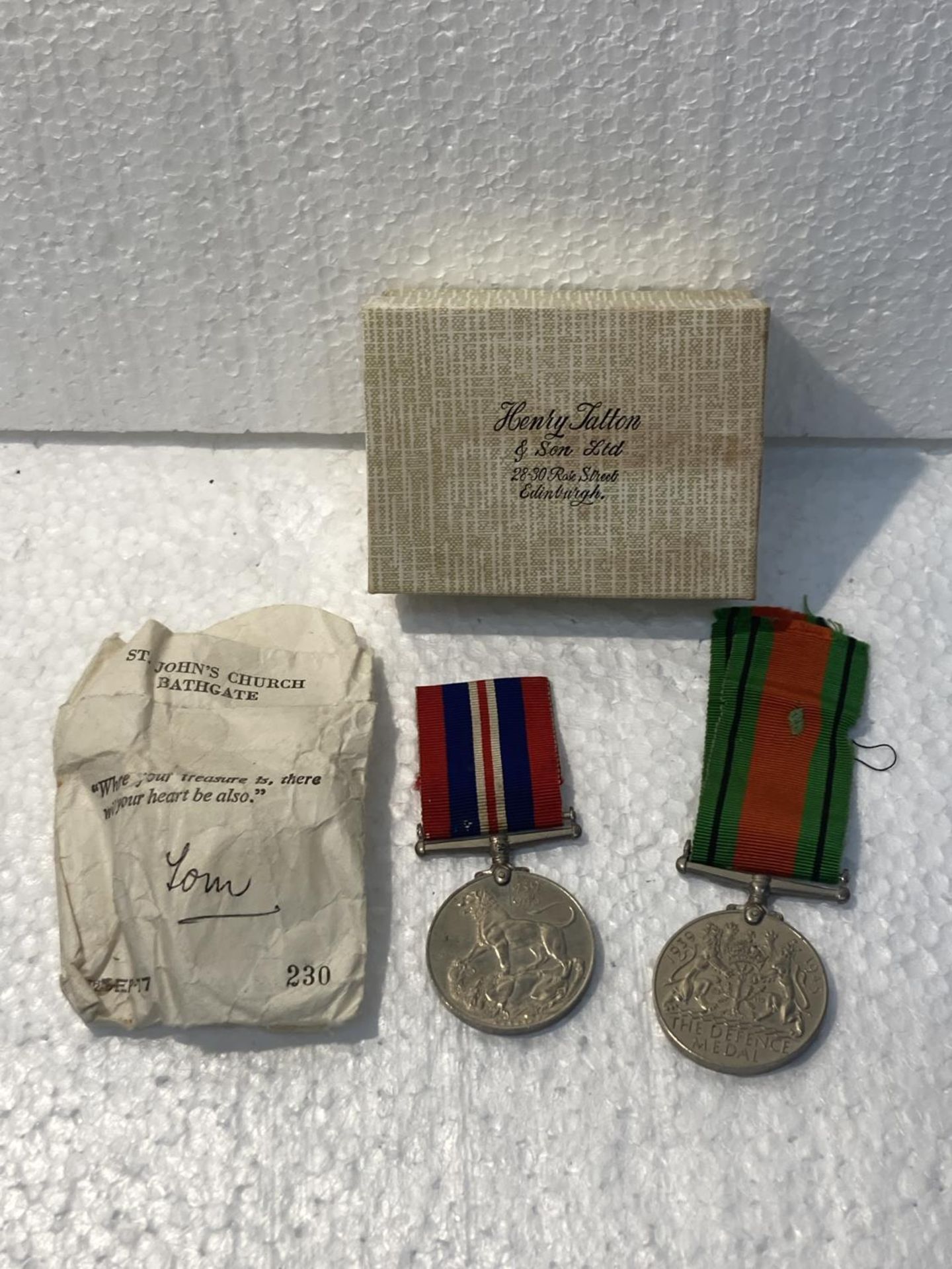 TWO WORLD WAR II MEDALS WITH RIBBONS