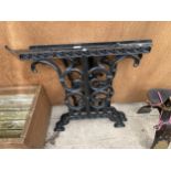 A DECORATIVE CAST IRON TABLE BASE