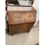 A WALNUT AND CROSSBANDED 'REPRODUX, BEVAN FUNNELL' BUREAU WITH FITTED INTERIOR, 29.5" WIDE