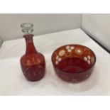 A RUBY COLOURED GLASS DECANTER AND BOWL