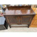 AN EARLY 20TH CENTURY OAK SIDEBOARD, 42" WIDE