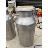 AN ALUMINIUM MILK CHURN WITH LID