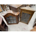 AN OAK CORNER CUPBOARD AND CANTED CORNER DISPLAY CABINET