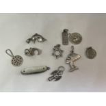 TEN SILVER CHARMS