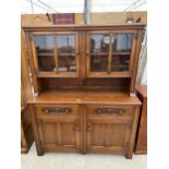 AN E.GOMME DRESSER, 54" WIDE, WITH GLAZED UPPER PORTION