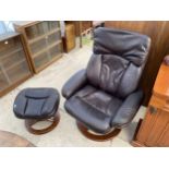A MORRIS FURNITURE GROUP FAUX LEATHER SWIVEL CHAIR AND MATCHING STOOL