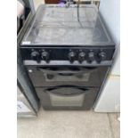 A BLACK MONTPELLIER FREESTANDING ELECTRIC OVEN AND HOB