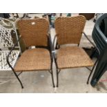 A PAIR OF METAL FRAMED RATTAN GARDEN CHAIRS